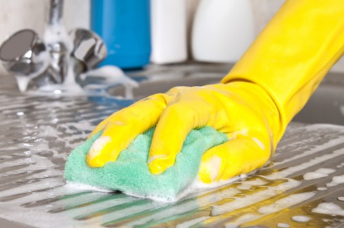 Safety-focused cleaning team working in a home